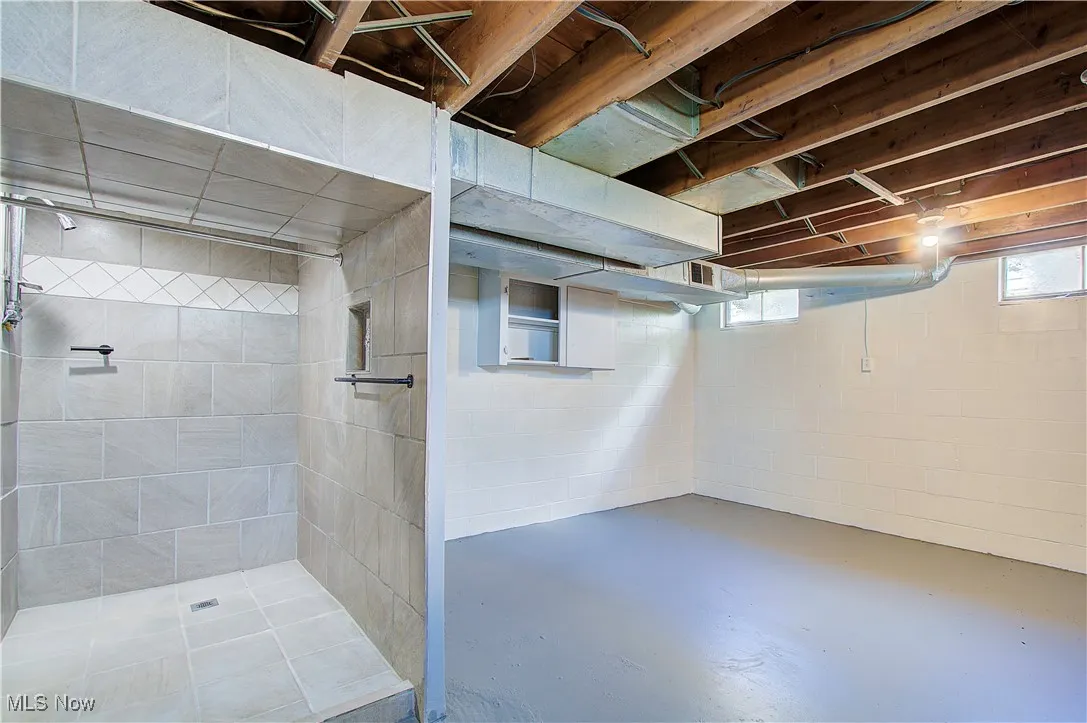 Newly tiled shower in basement.