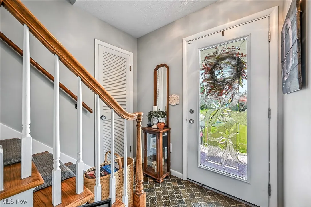 Entrance foyer with stairs