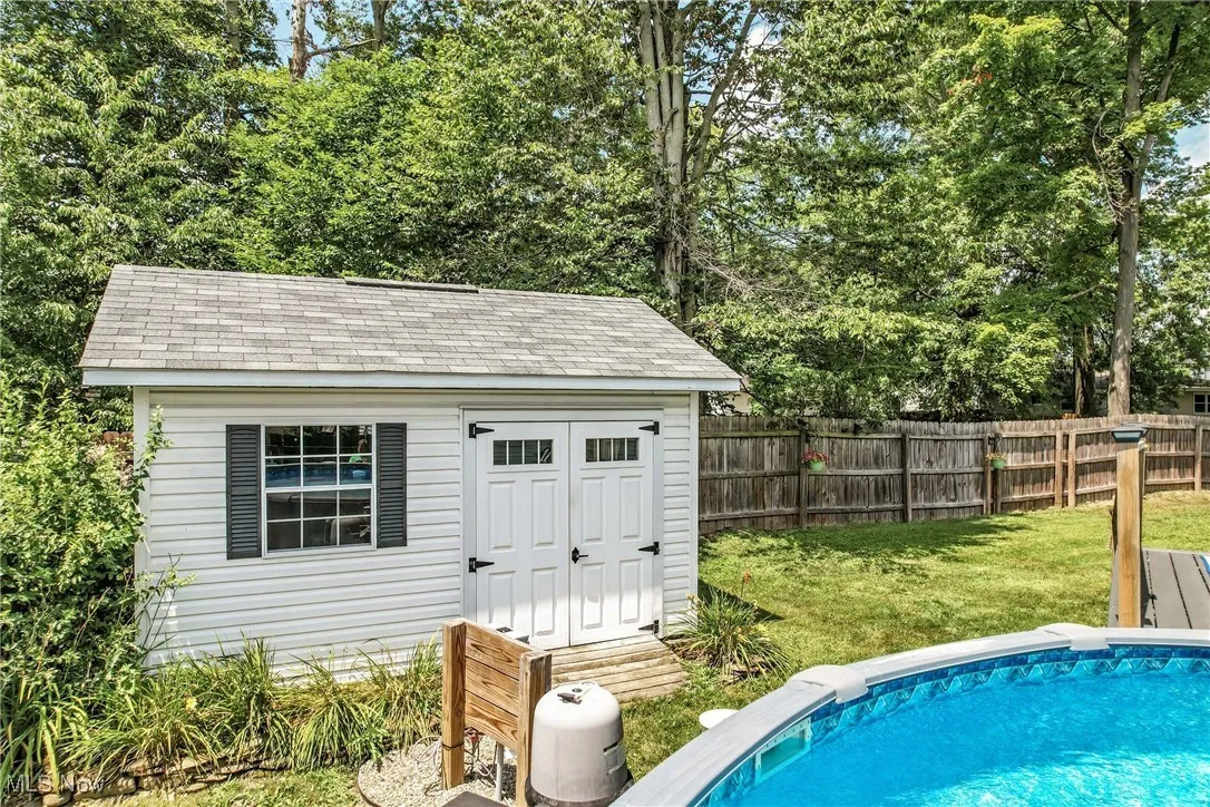 Swimming pool with a shed