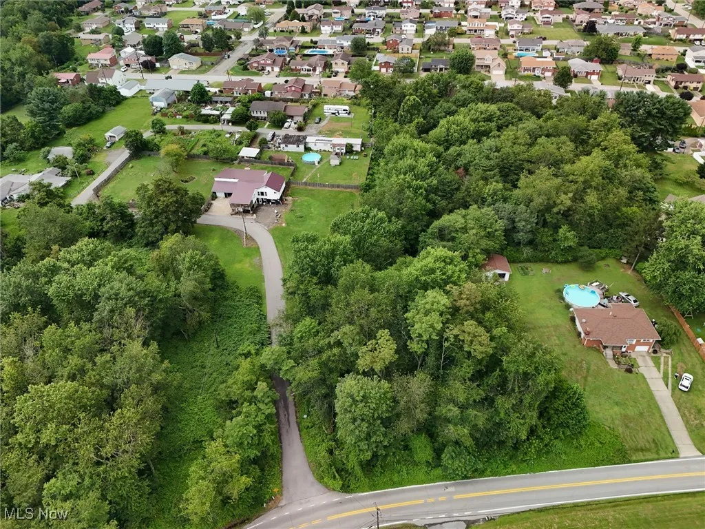 View of property location featuring nearby suburban area