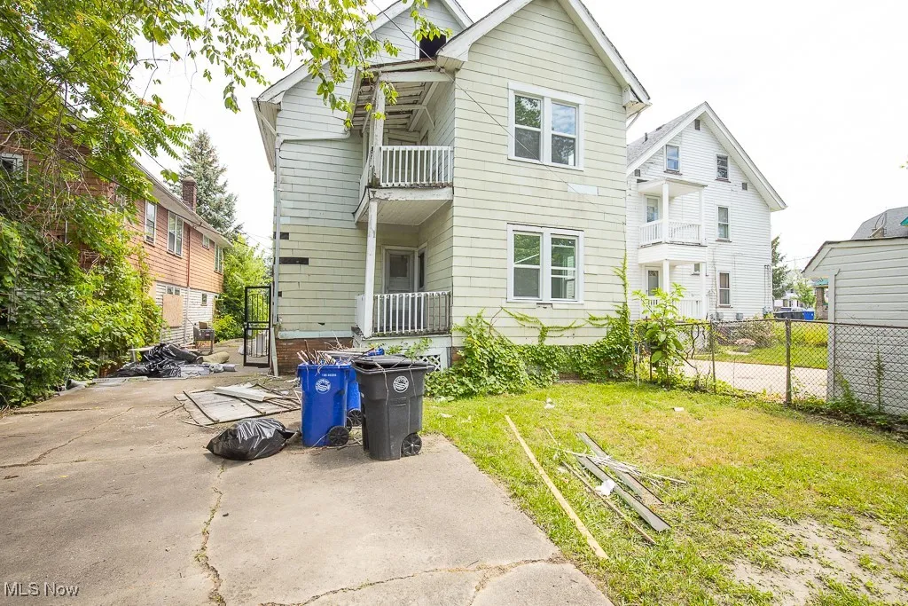 Rear view of property with a patio