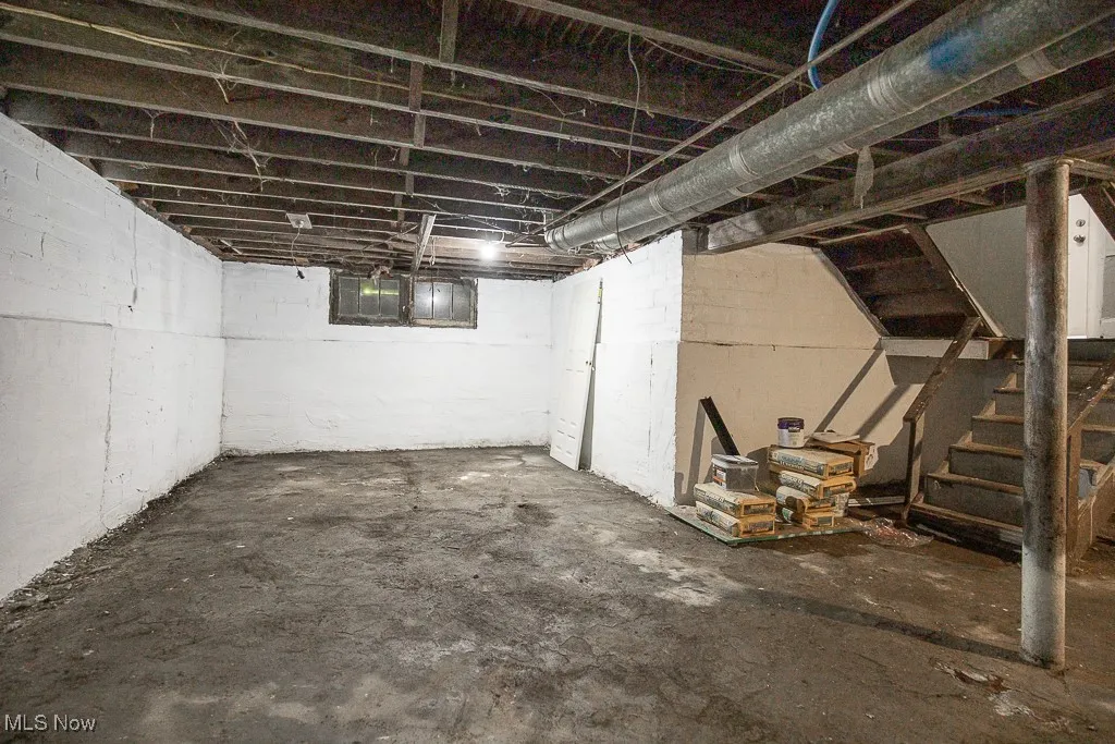 Unfinished below grade area with stairway