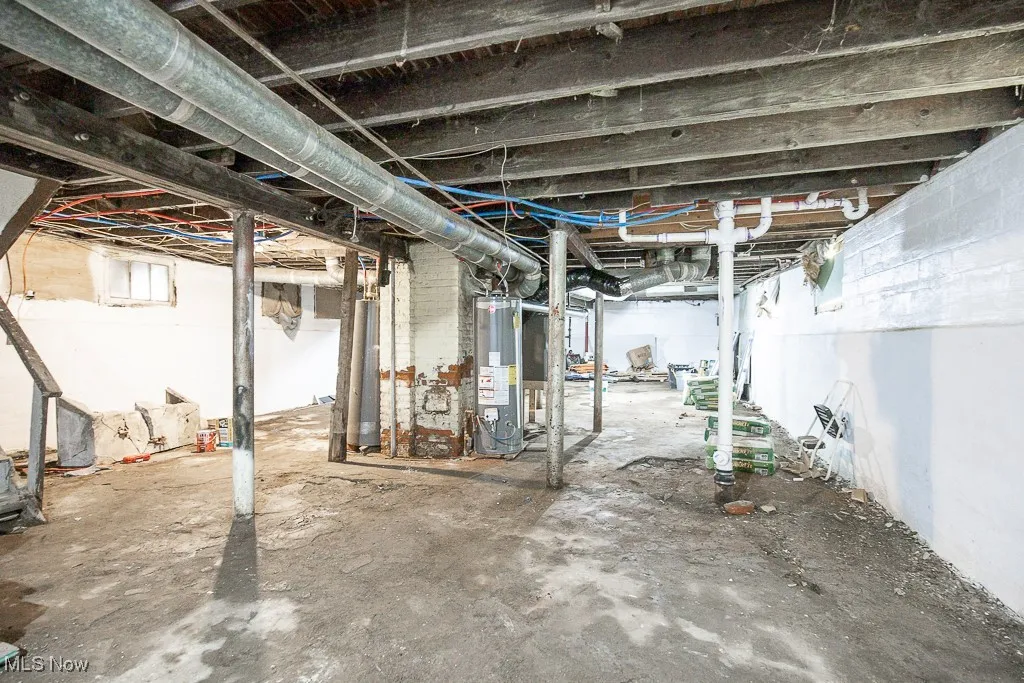 Unfinished basement with water heater