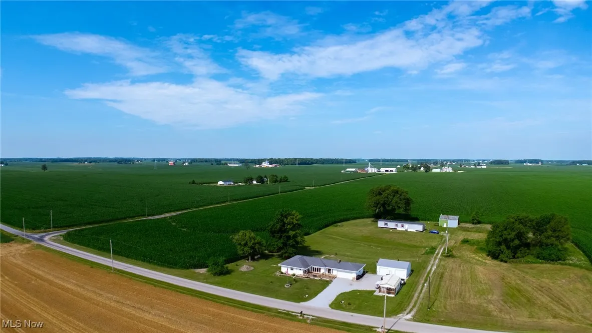 Aerial view of sparsely populated area featuring agricultural land