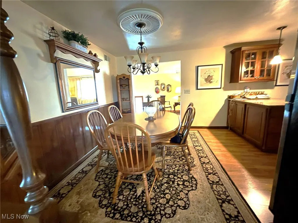 Dining area featuring a chandelier
