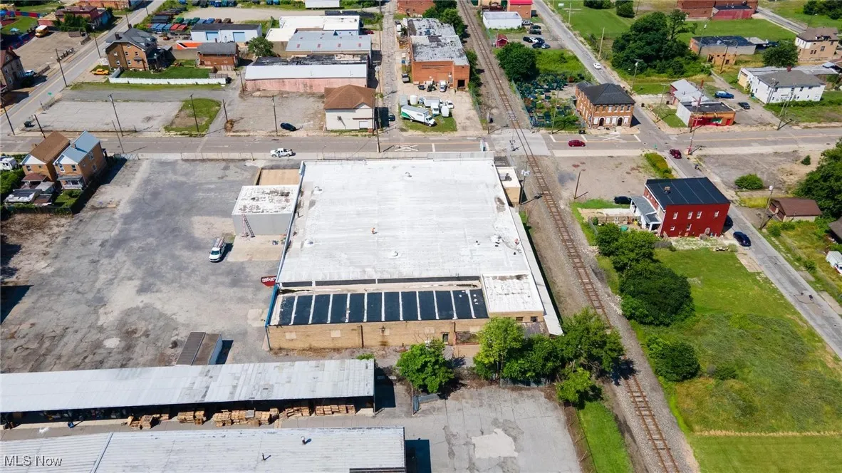View of property location with nearby suburban area