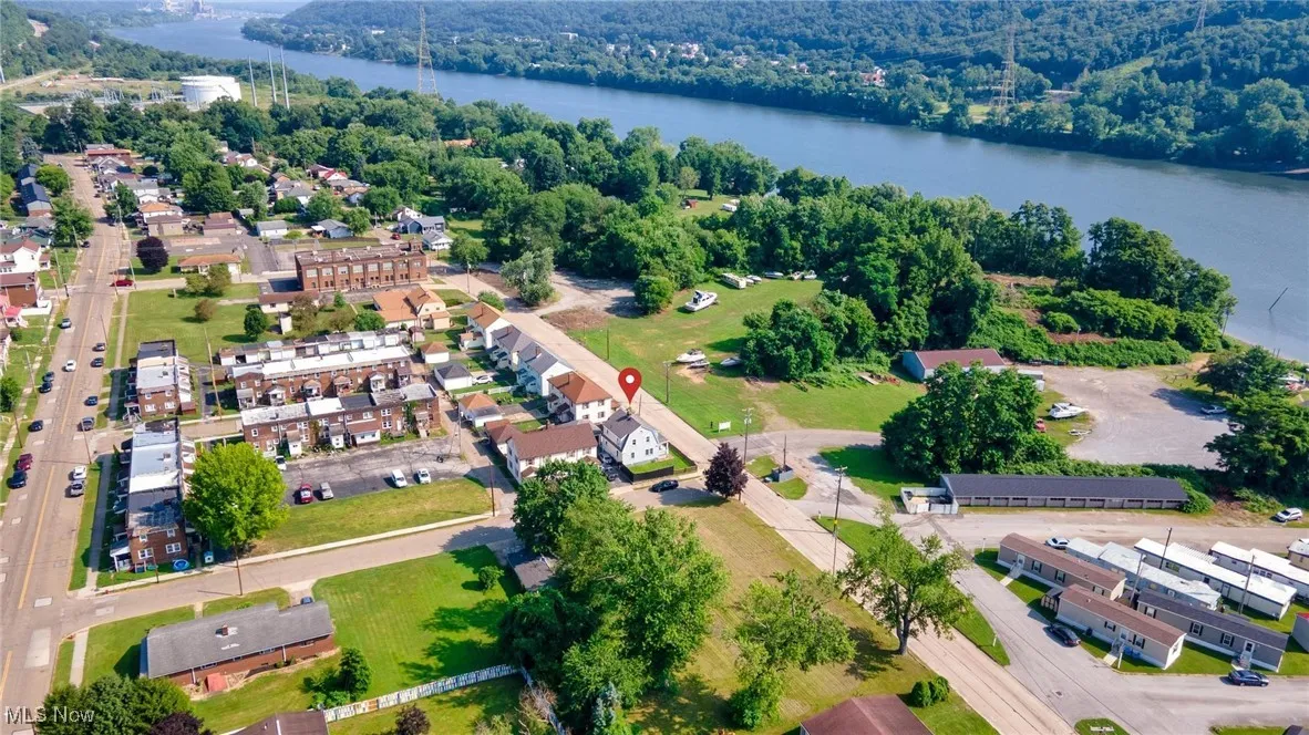 Bird's eye view of a large body of water and a heavily wooded area