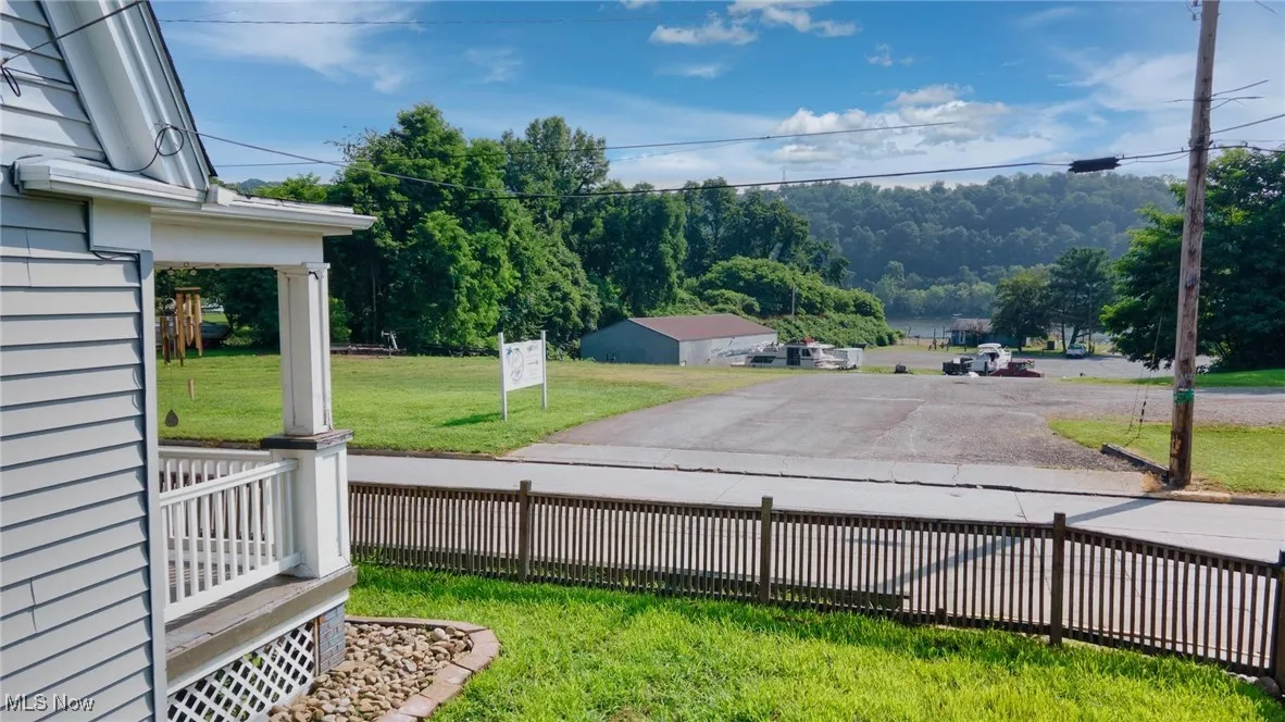View of yard with a porch