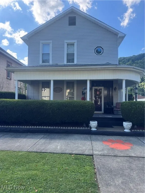View of front of property featuring a porch