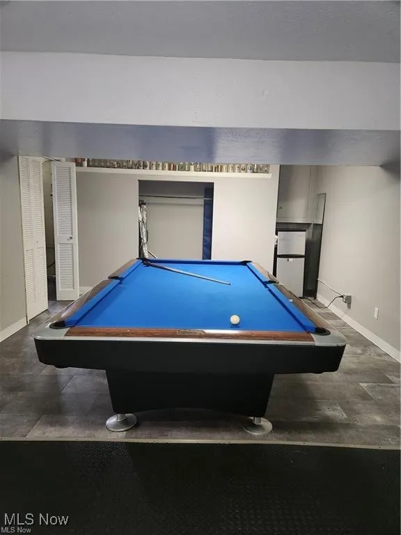 Recreation room featuring baseboards and billiards