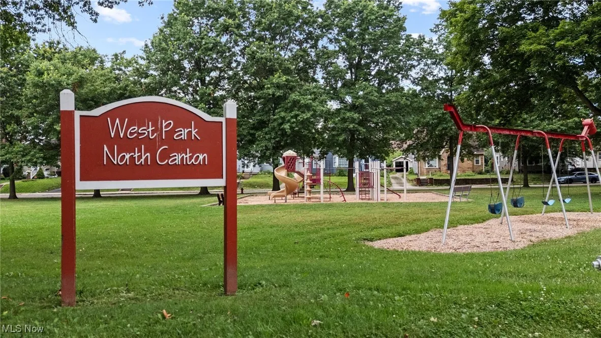 Community sign featuring a park and playground!