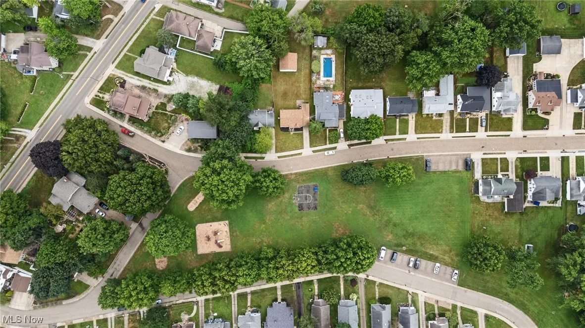 Aerial overview of property's location featuring park, playground and close to North Canton schools