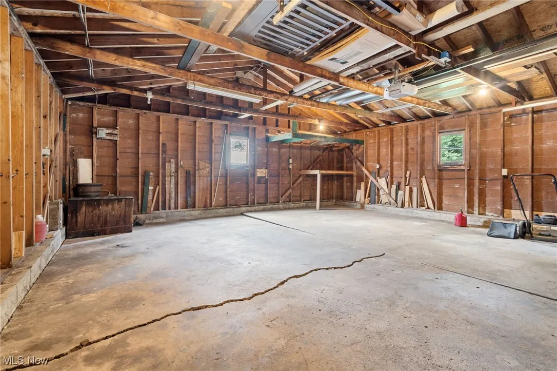 detached 2 car Garage with a garage door opener