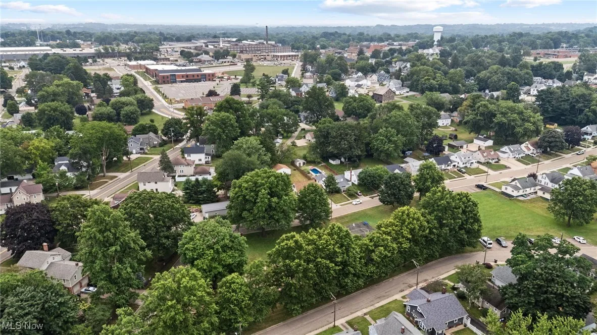 Aerial overview of property's location featuring nearby suburban area