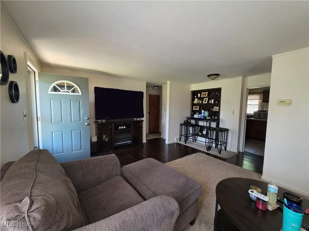 Living area with wood finished floors