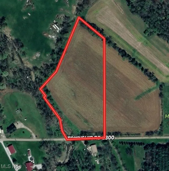 Aerial map of property and surrounding area with property parcel outlined