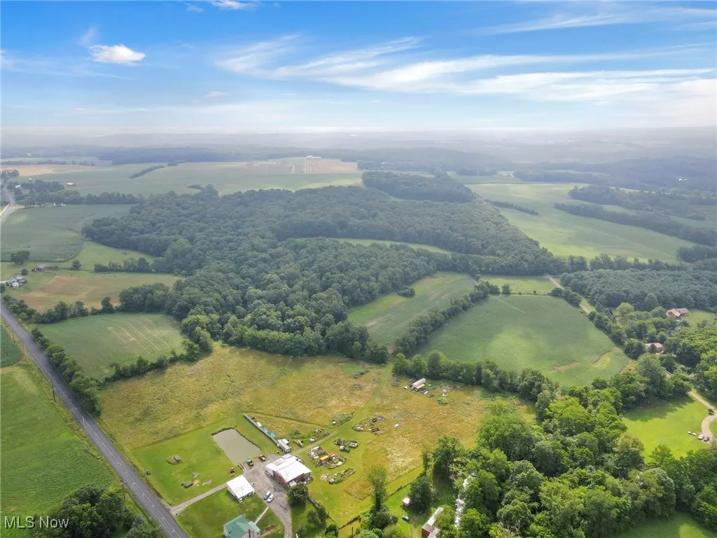 Aerial overview of property's location featuring rural landscape and a pastoral area