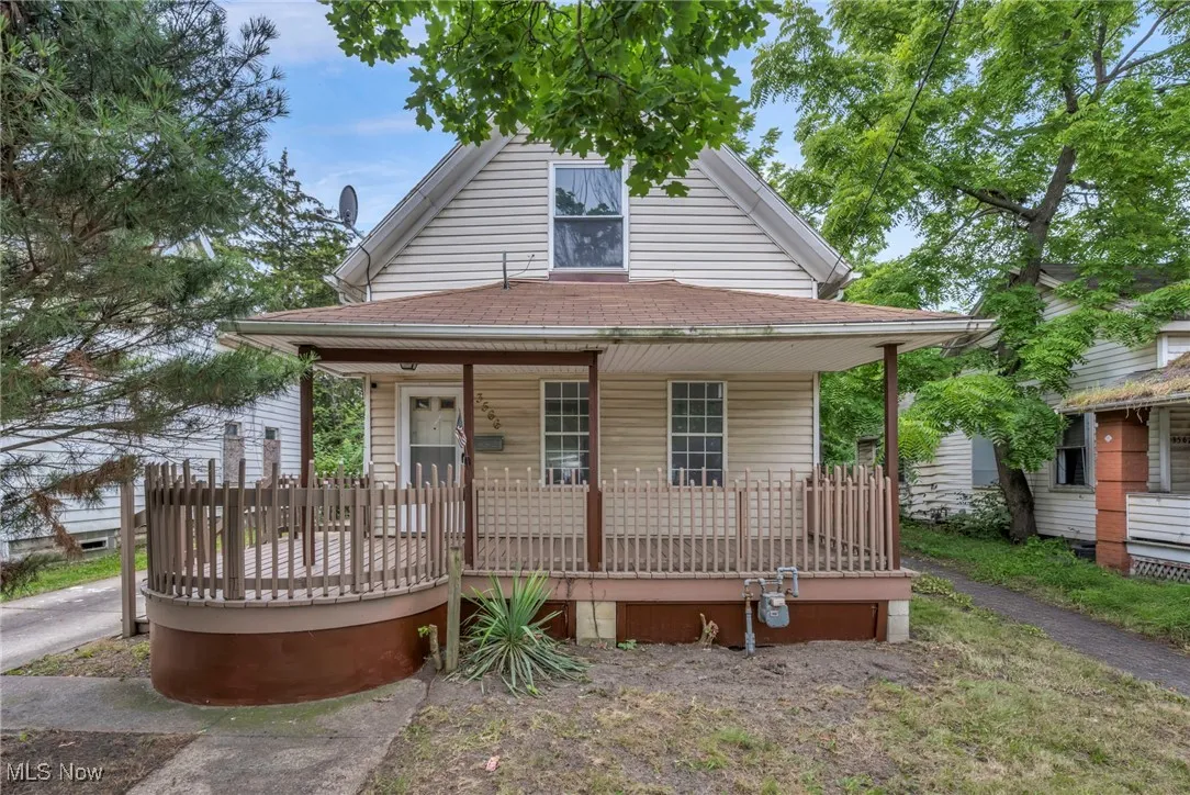 View of front of house featuring a porch and a shingled roof