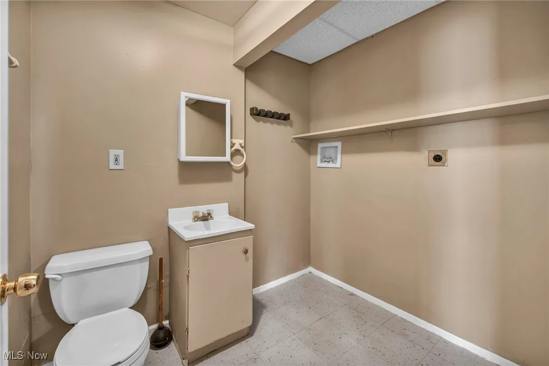 Bathroom with vanity and toilet