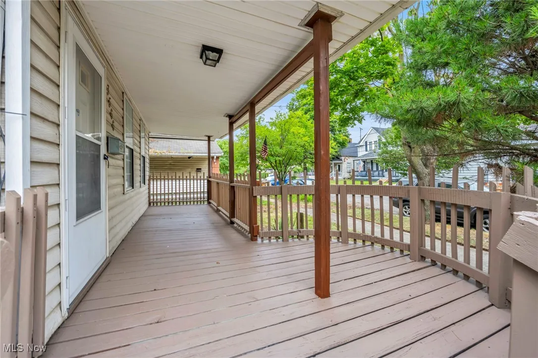 Wooden deck featuring a residential view