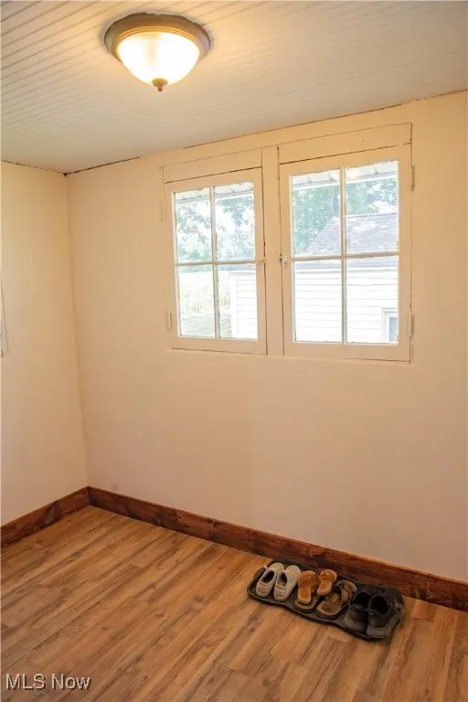 Empty room with wood finished floors