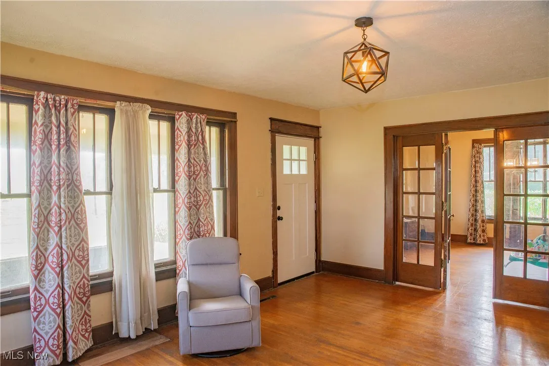 Sitting room featuring wood finished floors