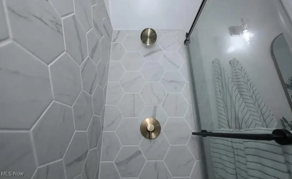 Bathroom with a tile shower