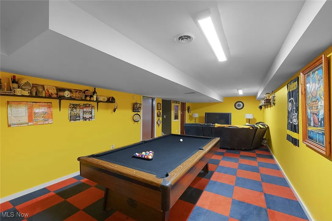 Playroom with tile patterned floors and pool table