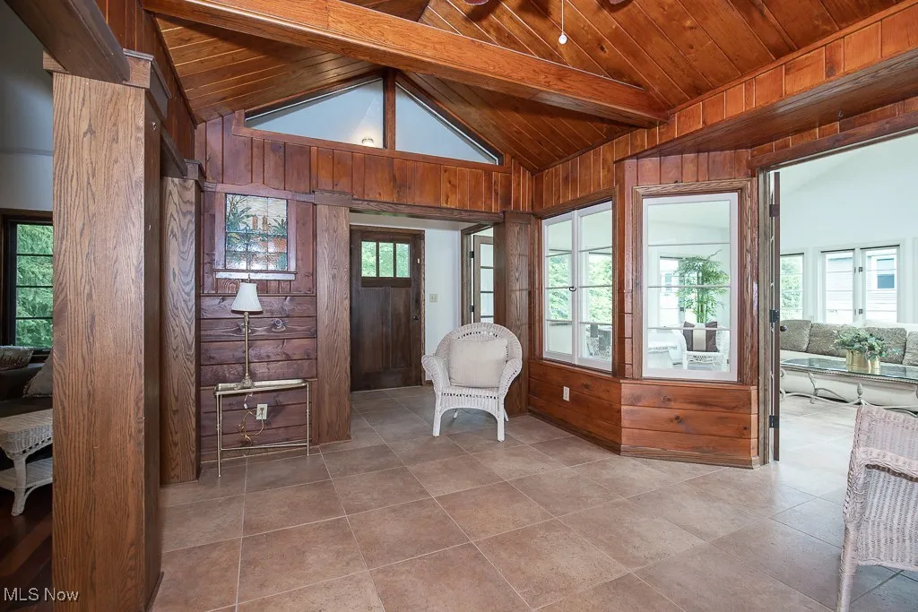 Tiled entryway with wooden ceiling and wooden​​‌​​​​‌​​‌‌​‌‌​​​‌‌​‌​‌​‌​​​‌​​ walls