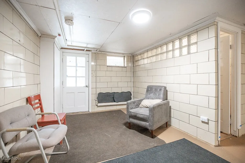 Living area with carpet flooring