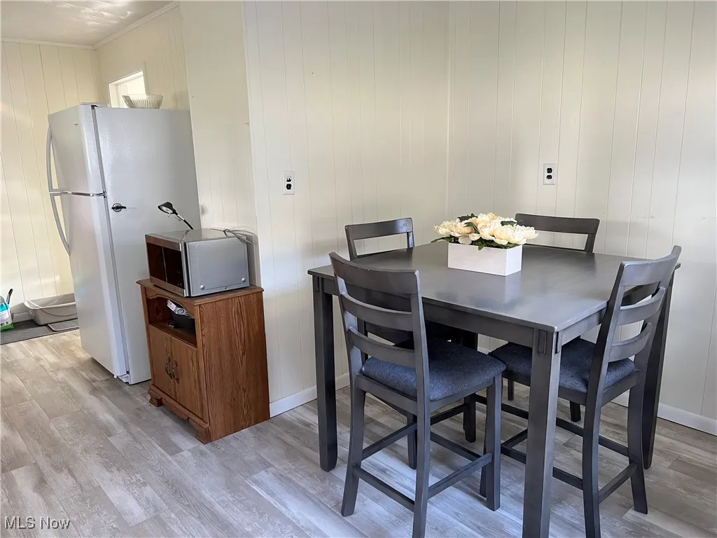 Dining space featuring light wood-style flooring