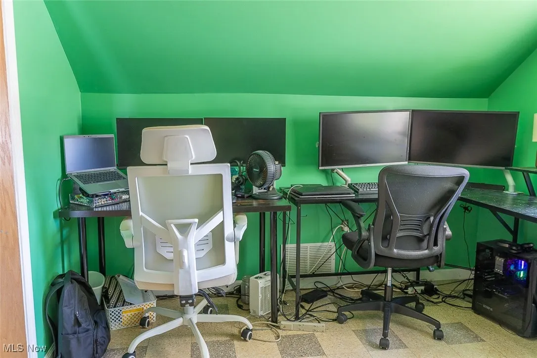 Office space/bedroom four with tile patterned floors