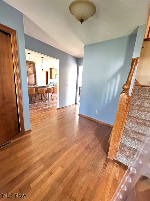 Foyer with hard wood floors