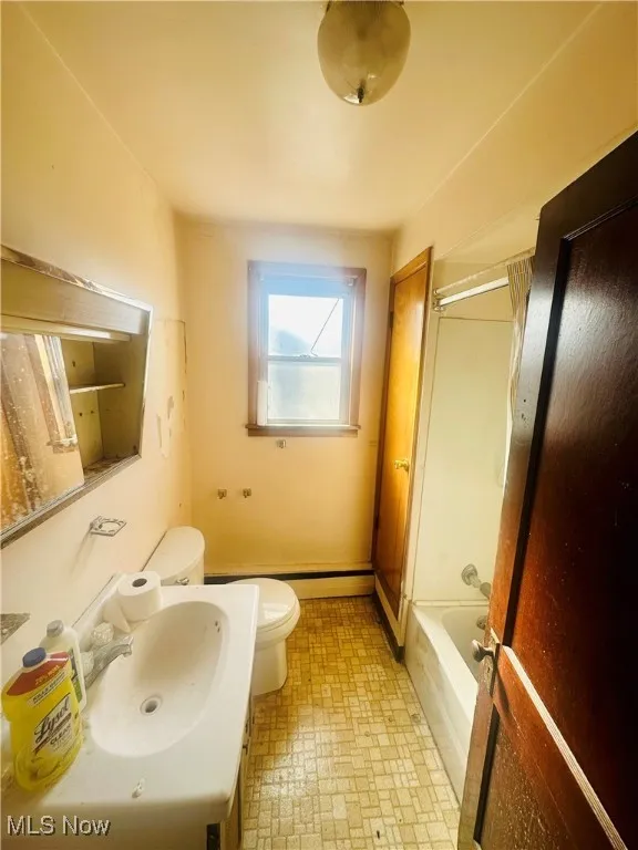 Unfurnished room featuring carpet flooring and a textured ceiling