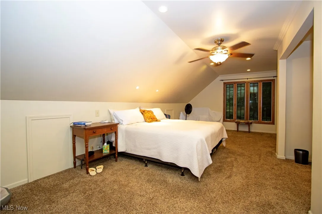 Bedroom featuring carpet, lofted ceiling, ceiling fan, and recessed lighting