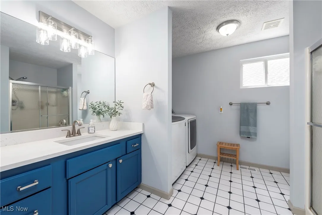  Primary bathroom with laundry