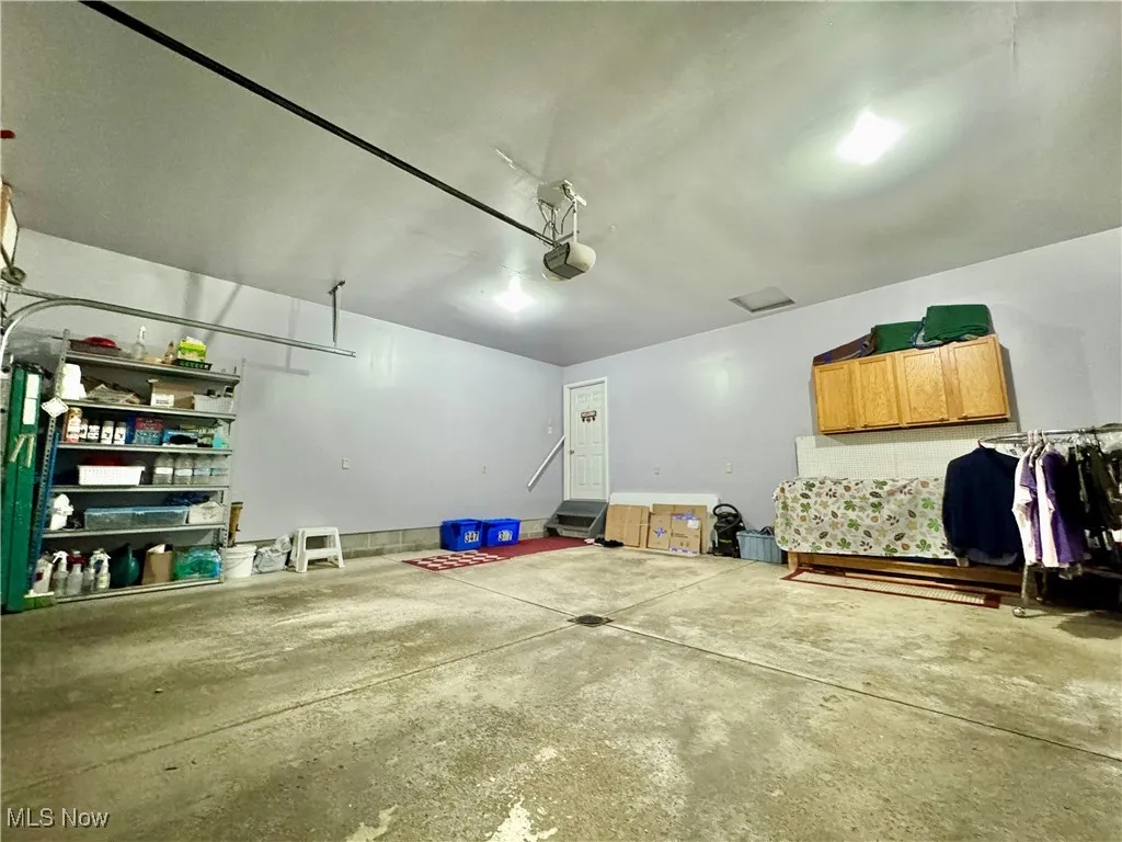 Attached 2 car garage all finished walls with plenty of space.