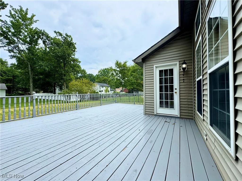 Wooden deck with a yard