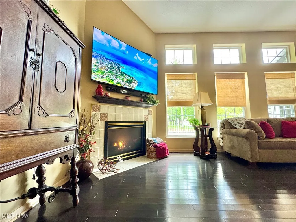 Living area featuring hardwood / wood-style floors and a gas fireplace