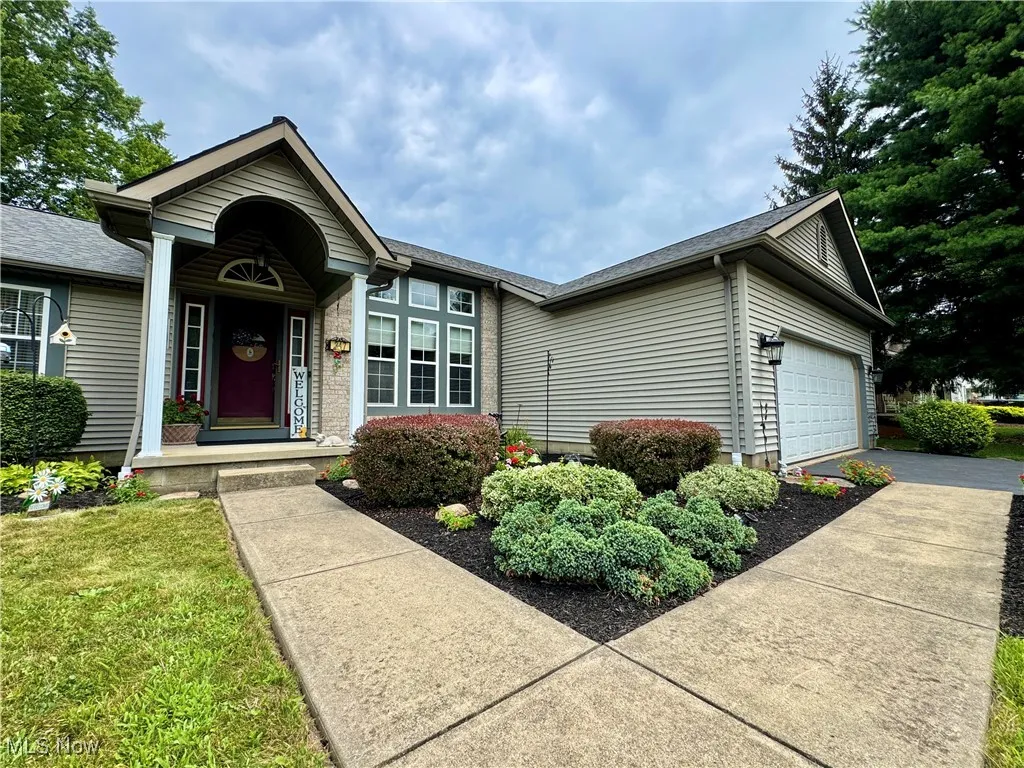 Front entrance and 2 car att garage