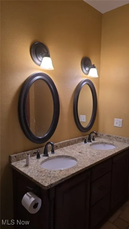 Bathroom featuring double vanity