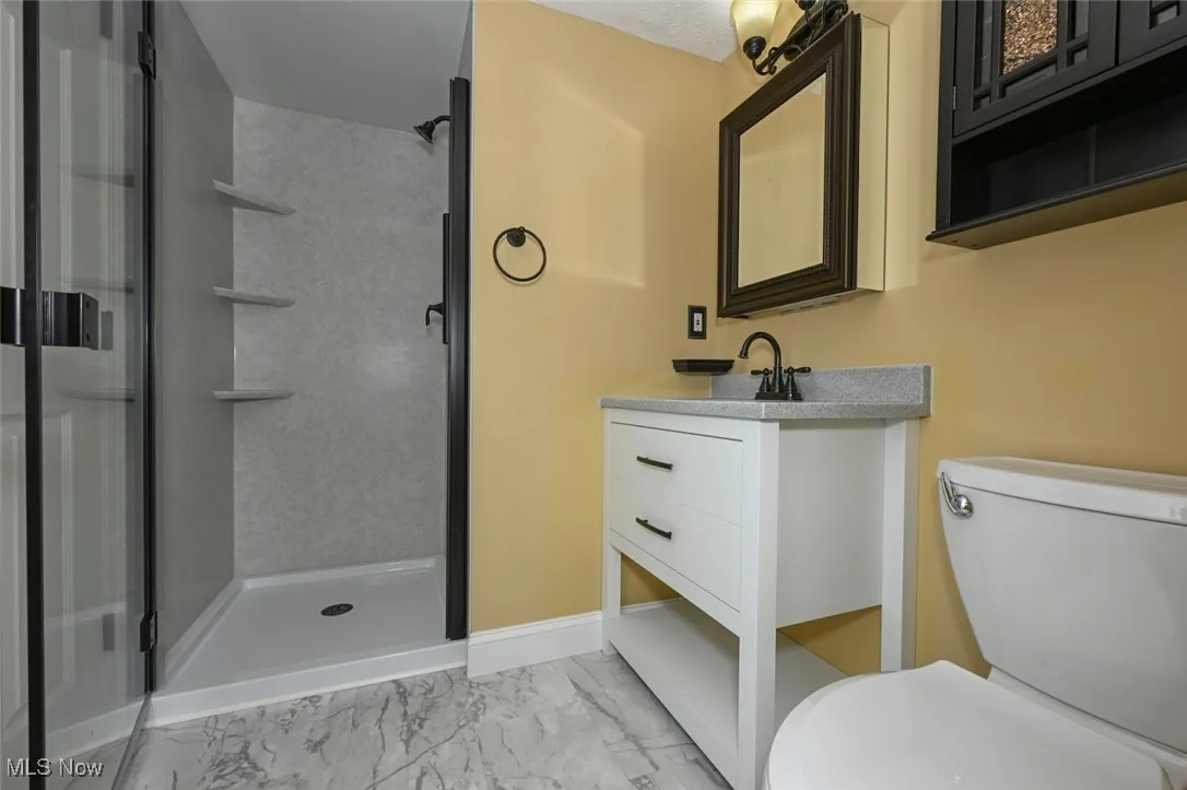 Ist floor bath has been updated and features a stand alone shower