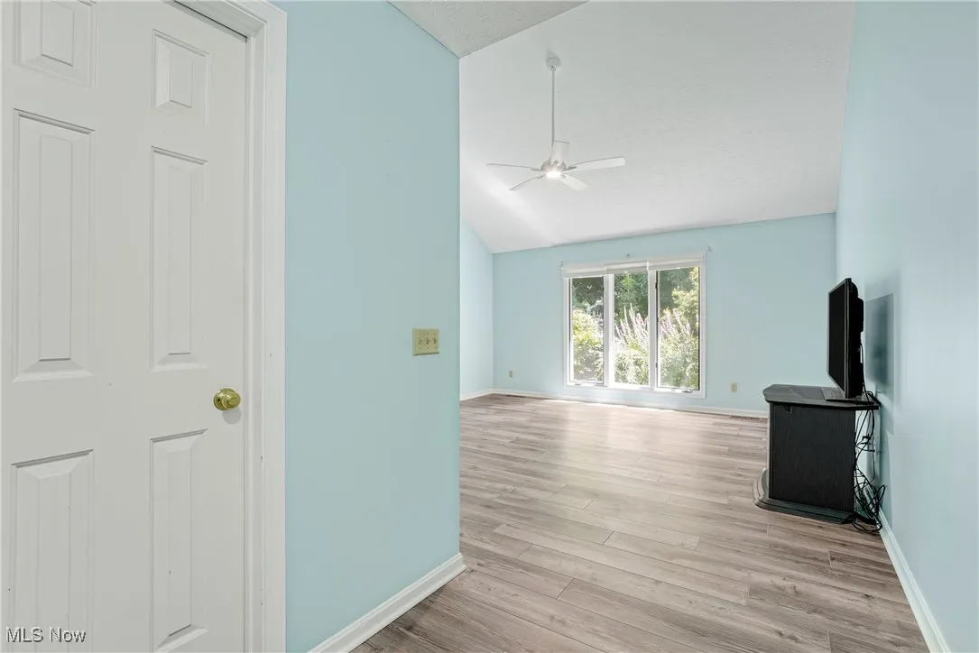 1st floor primary suite with an updated glamour bath and large walk-in closet