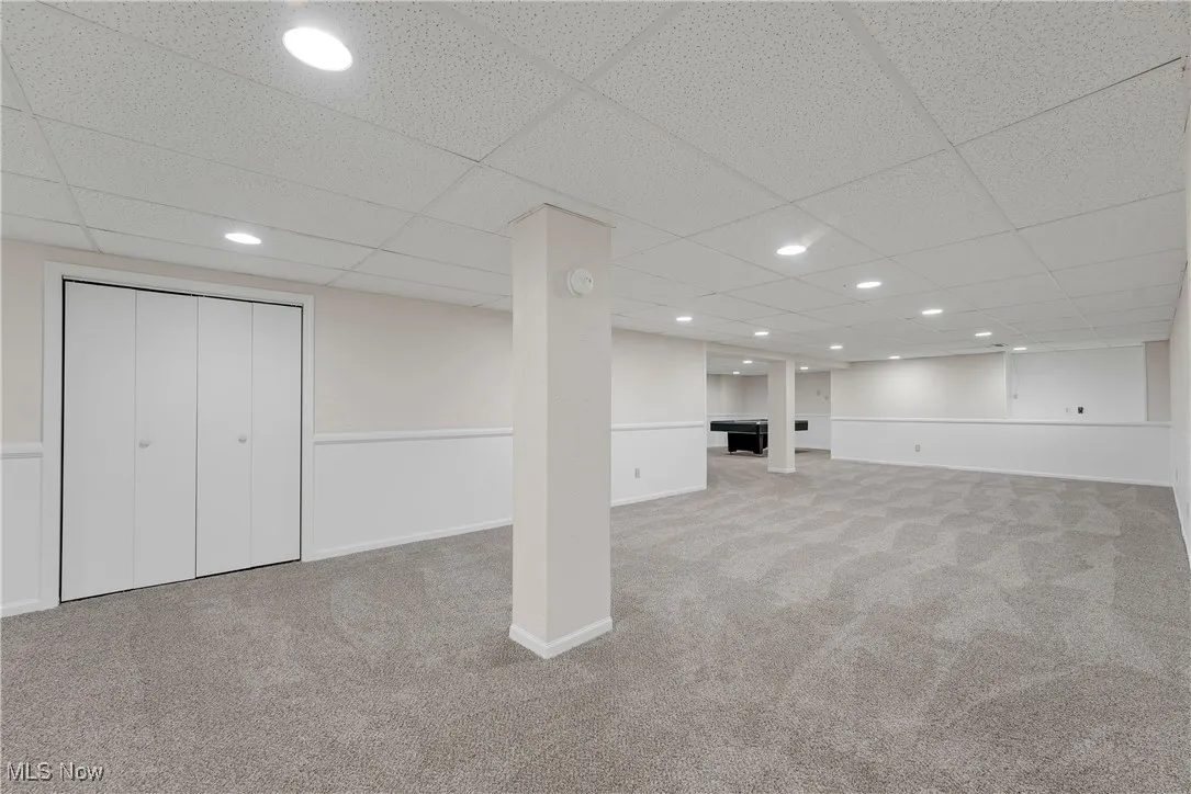 Finished lower level with fresh paint and carpet