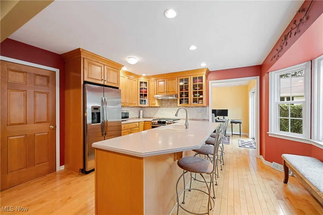 Updated kitchen with bar stool seating.