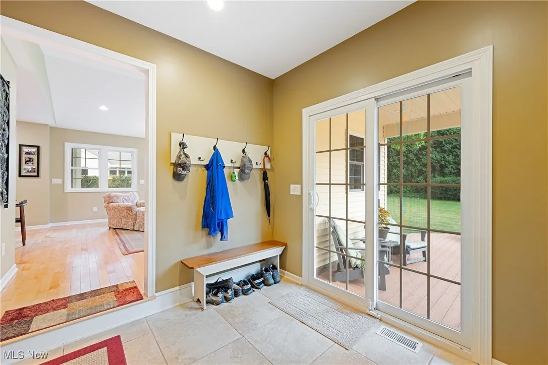 Great mudroom area with access to the garage and back deck.