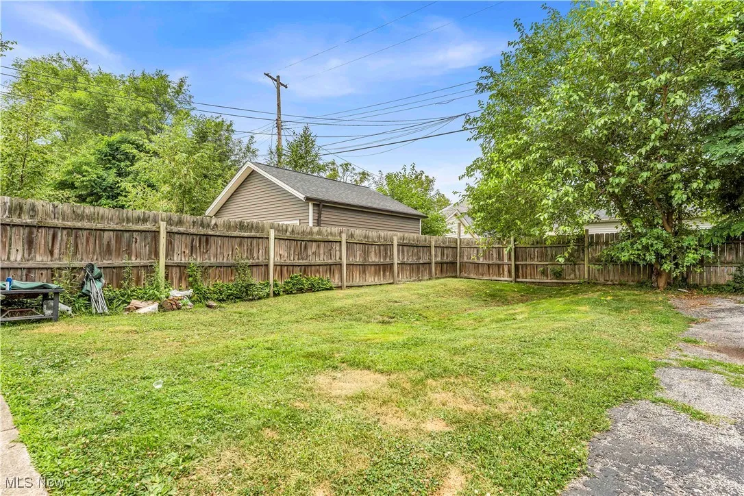 View of fenced backyard