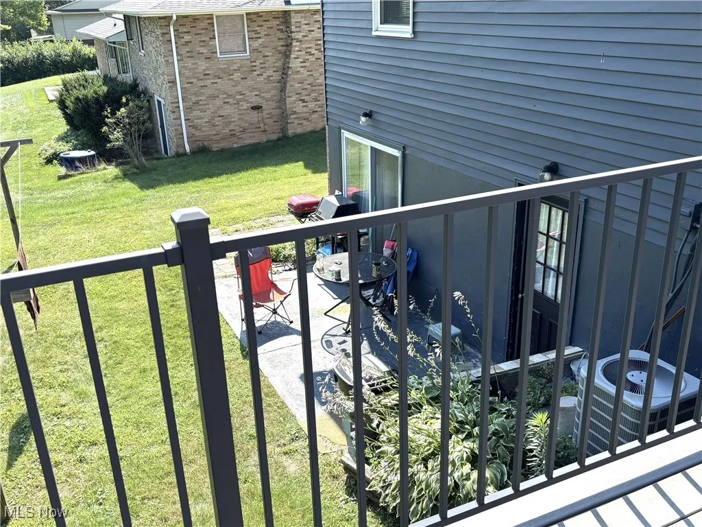 From the deck, overlooking lower entry and patio.