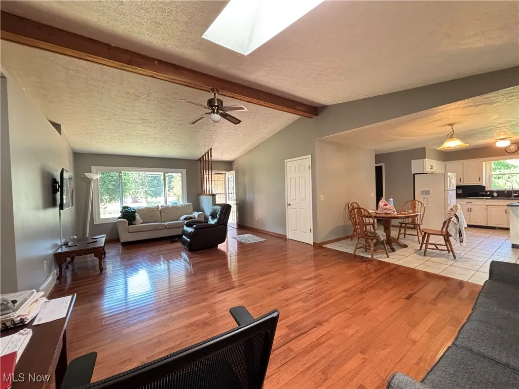Skylight floods the room with natural light.