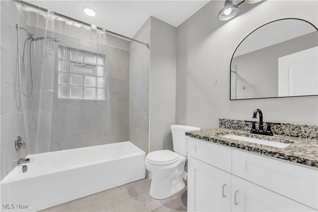 Full bath with vanity and  shower combination